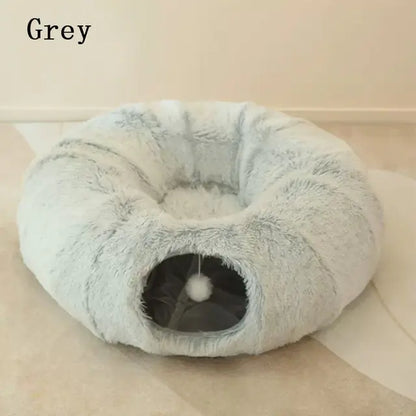 Gray donut-shaped pet bed on a light background